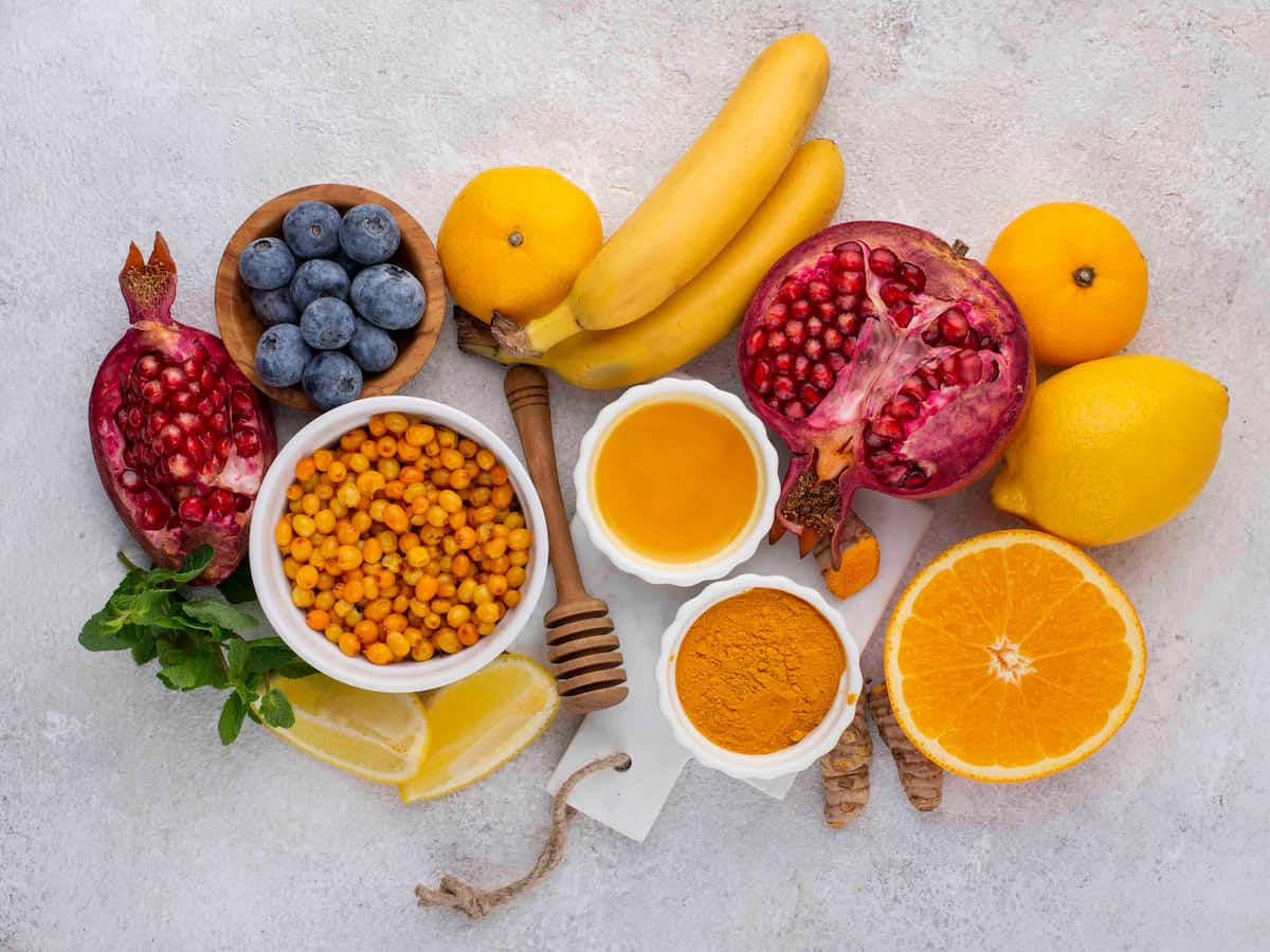 A flat lay of healthy and ideal foods to eat after hair transplant.